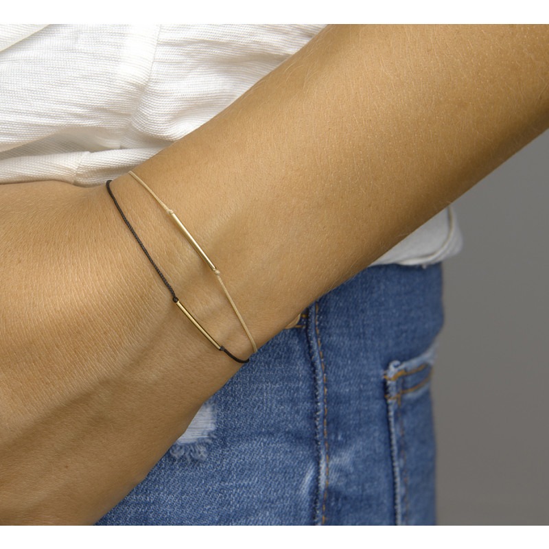 wervelkolom revolutie generatie Katoenen armband met gouden staafje | Mostert Juweliers