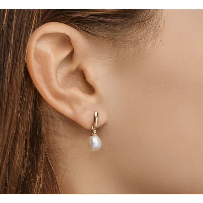 helaas werkelijk Correspondentie Gouden parel oorbellen met zirkonia | Mostert Juweliers